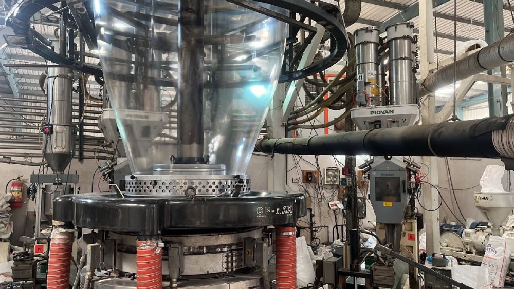 Industrial blown film extrusion line producing polymer film