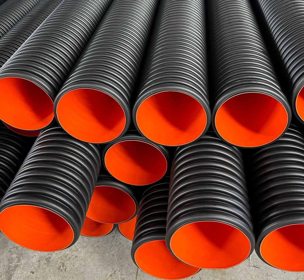 Stacked black corrugated pipes with orange interior lining