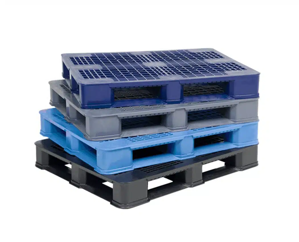 Stack of heavy-duty plastic pallets for industrial and construction logistics